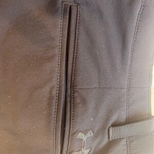 Under Armour Black Pants with Red Waistband.  Worn but in fantastic condition!